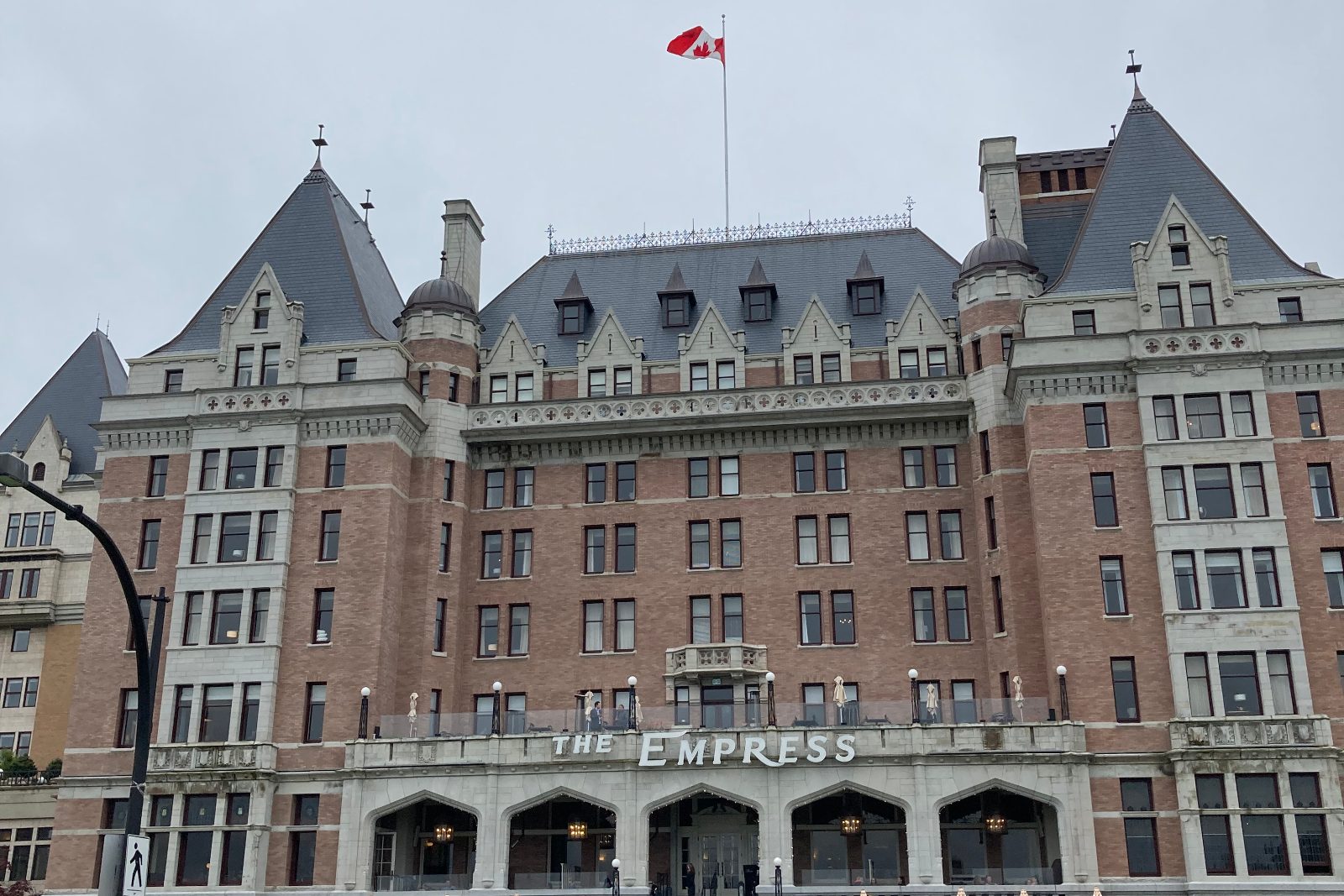 The Empress in Victoria, British Columbia, with the Canadian flag flying above it